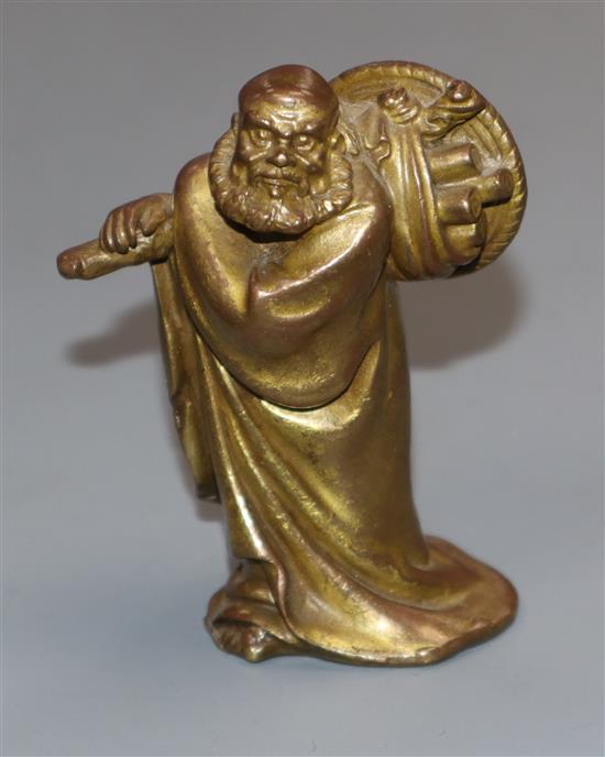 A Chinese gilt copper figure H.8cm